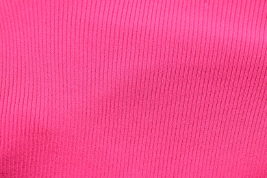 Texture of pink fabric as background, top view