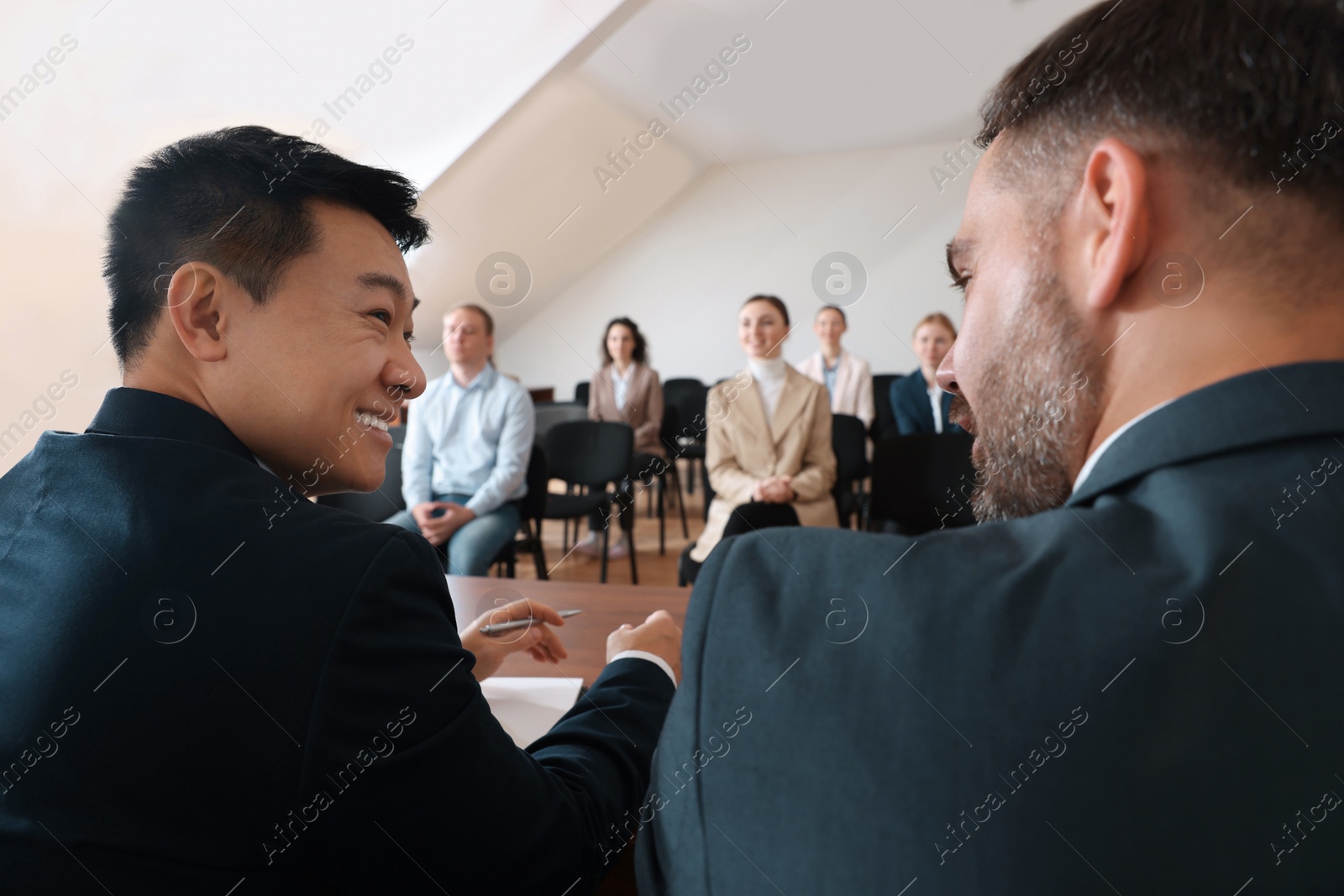Photo of Business people having discussion in conference room