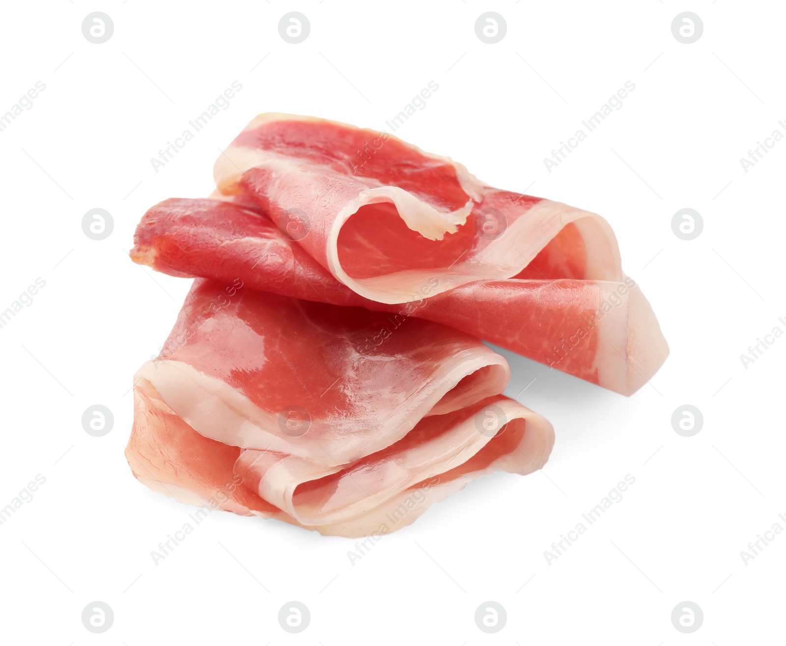 Photo of Slices of delicious jamon on white background