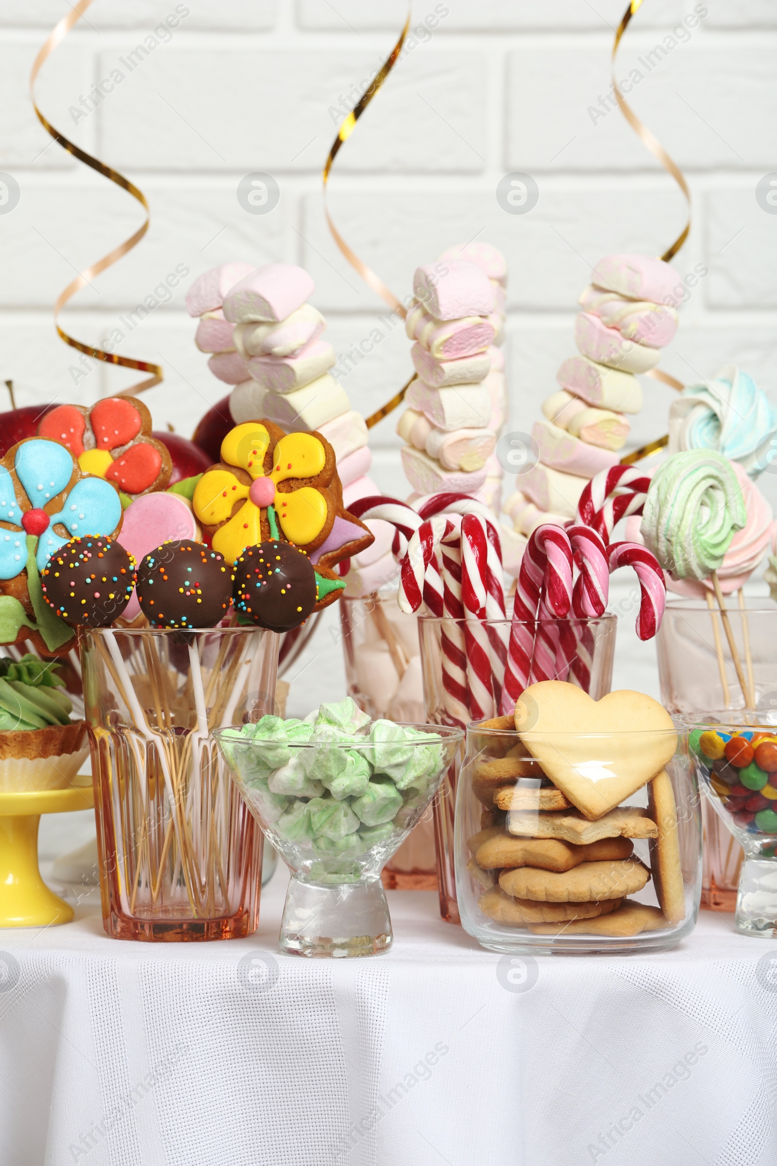 Photo of Candy bar with delicious treats for birthday party