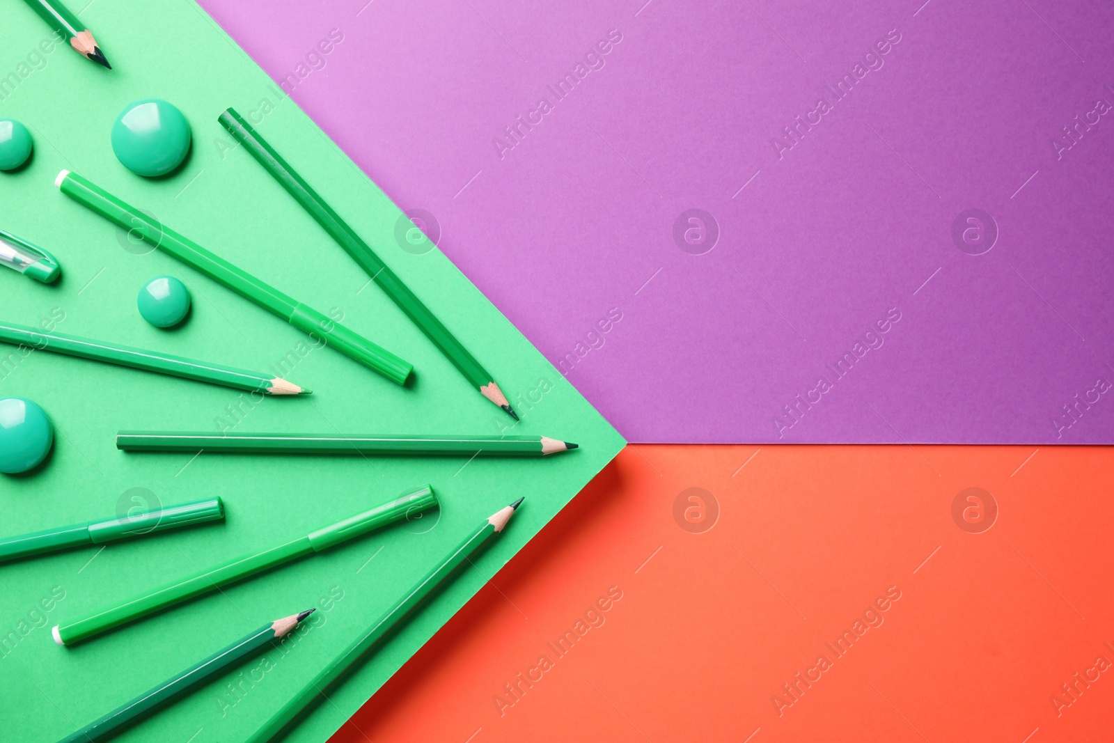 Photo of School stationery on color background, flat lay. Space for text