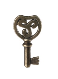 Bronze vintage ornate key on white background