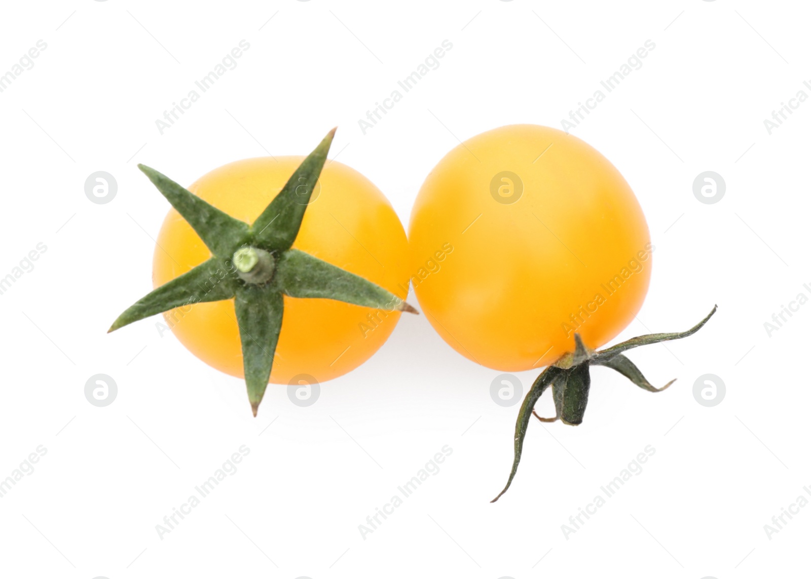 Photo of Ripe yellow cherry tomatoes on white background, top view