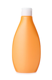Photo of Orange plastic bottle with cosmetic product isolated on white