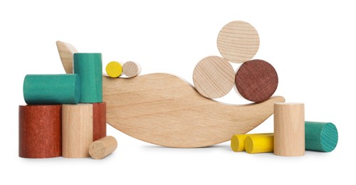 Photo of Wooden pieces for balance game isolated on white. Educational toy for motor skills development