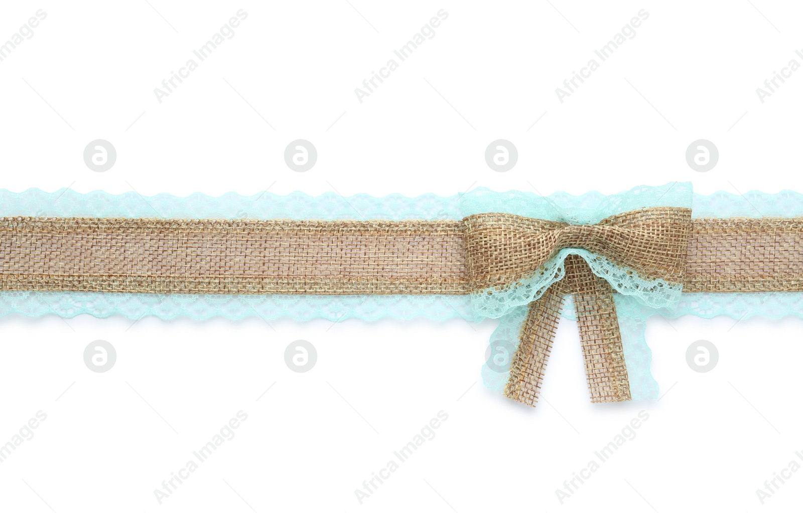 Photo of Burlap ribbon and bow with light blue lace on white background, top view