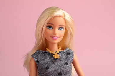 Photo of Mykolaiv, Ukraine - September 2, 2023: Beautiful Barbie doll on pale pink background