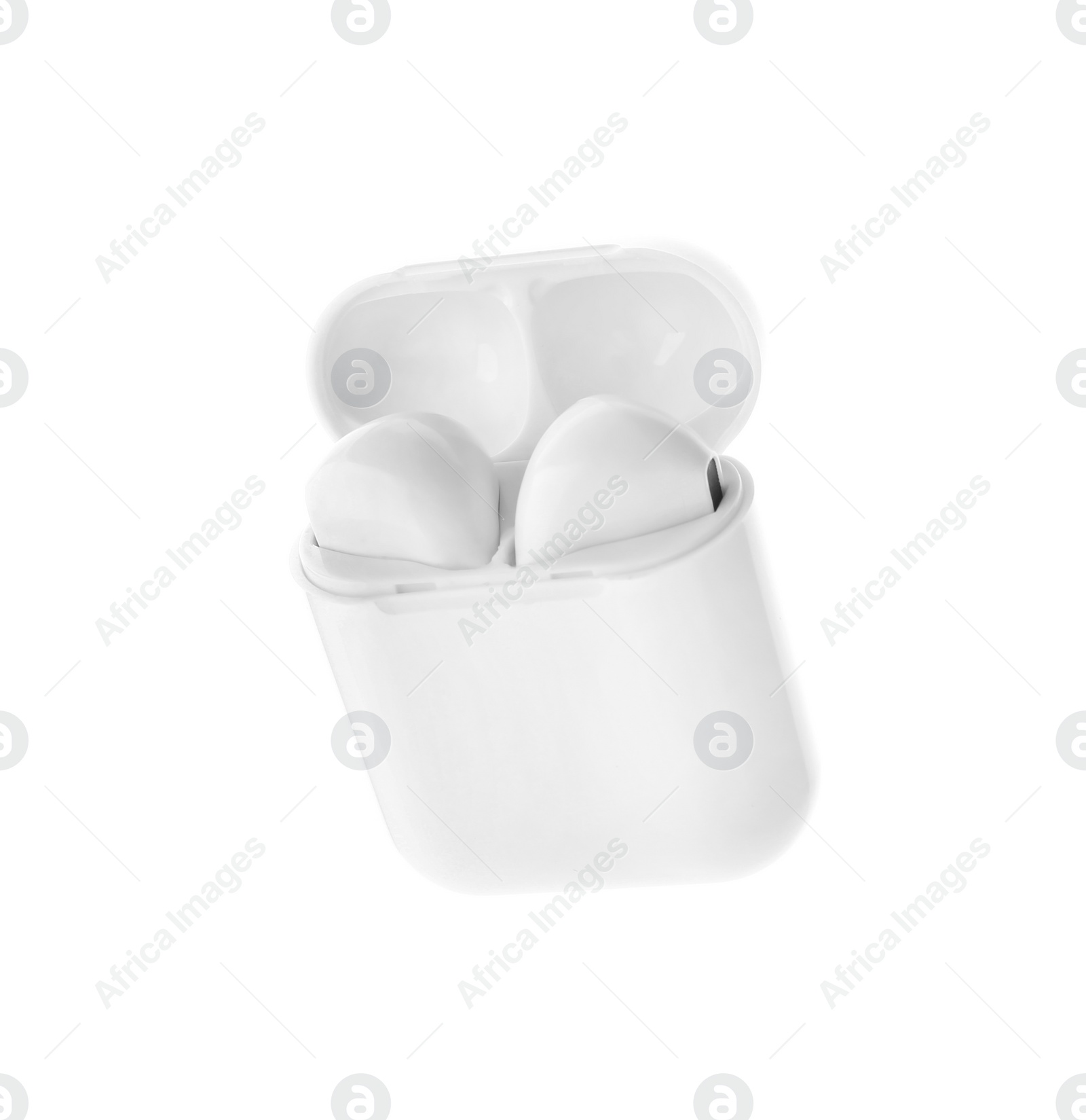 Photo of Modern wireless earphones in charging case on white background