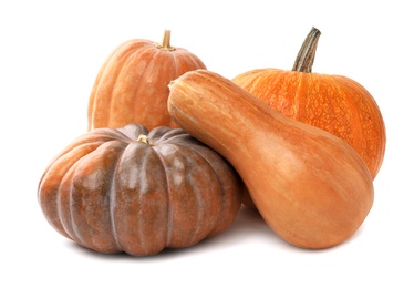 Photo of Fresh orange raw pumpkins isolated on white