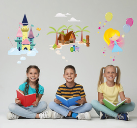 Image of Happy children reading books on grey background
