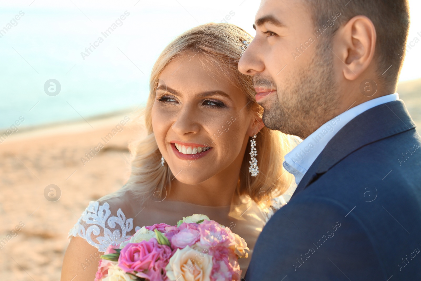 Photo of Wedding couple. Bride and groom on beach