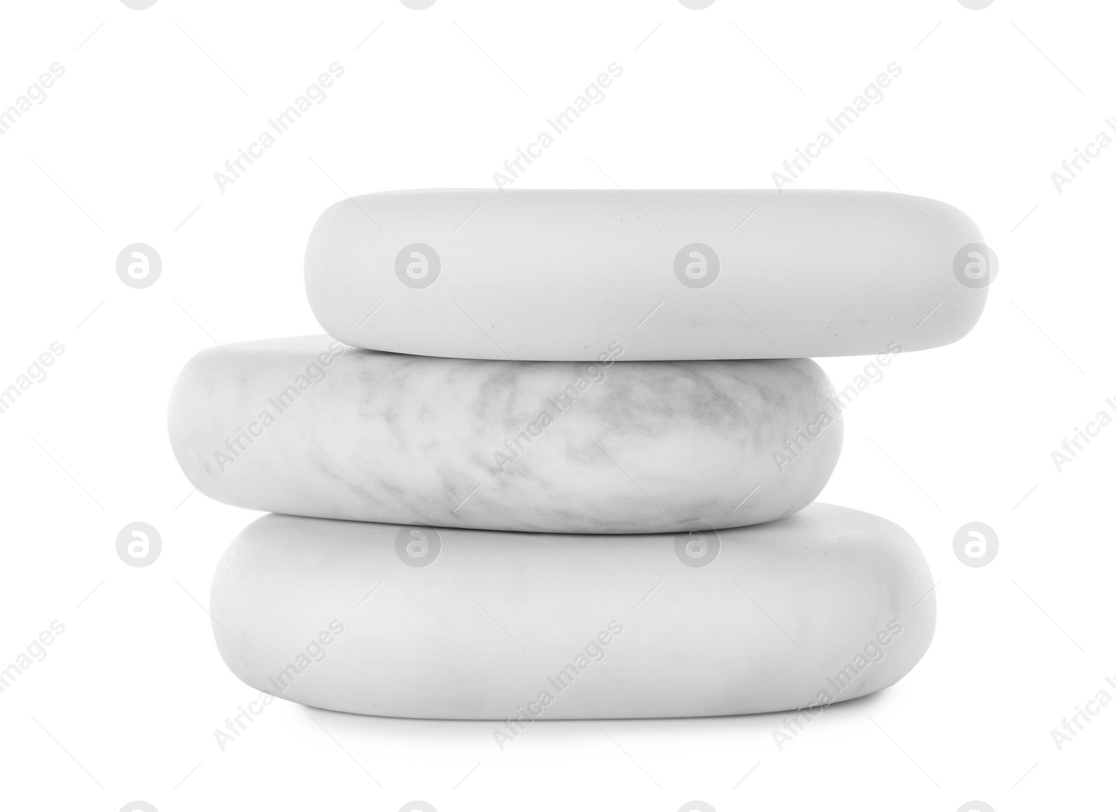 Photo of Stack of spa stones on white background