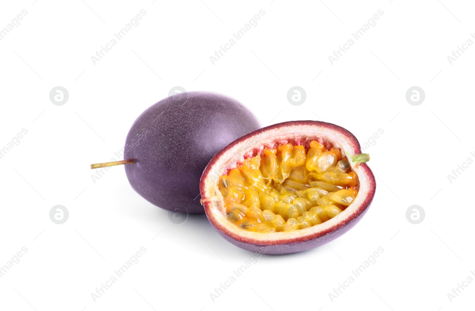 Photo of Cut and whole passion fruits on white background