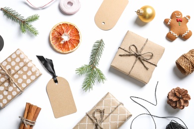 Flat lay composition with Christmas gifts on white background