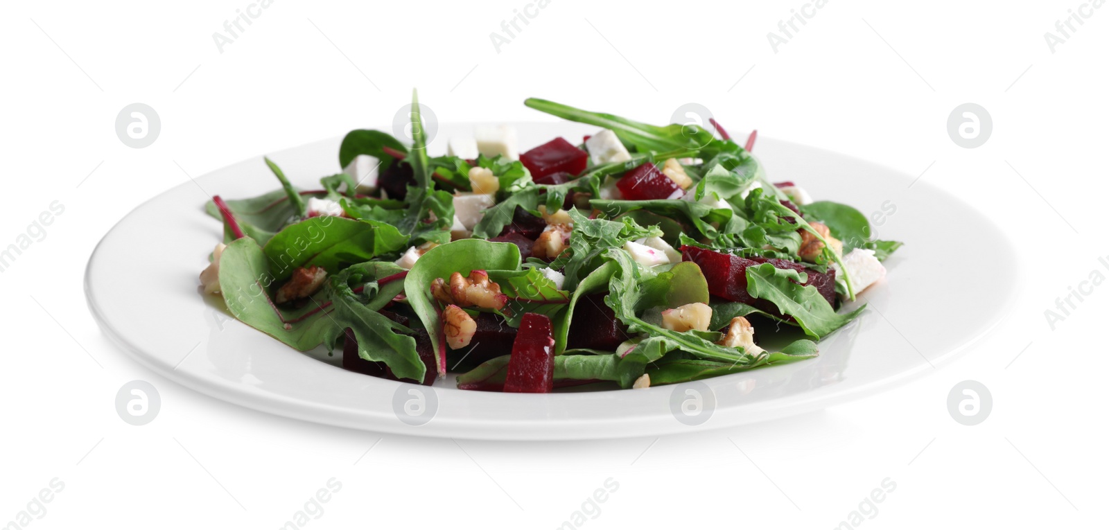 Photo of Delicious beet salad with feta cheese and walnuts isolated on white