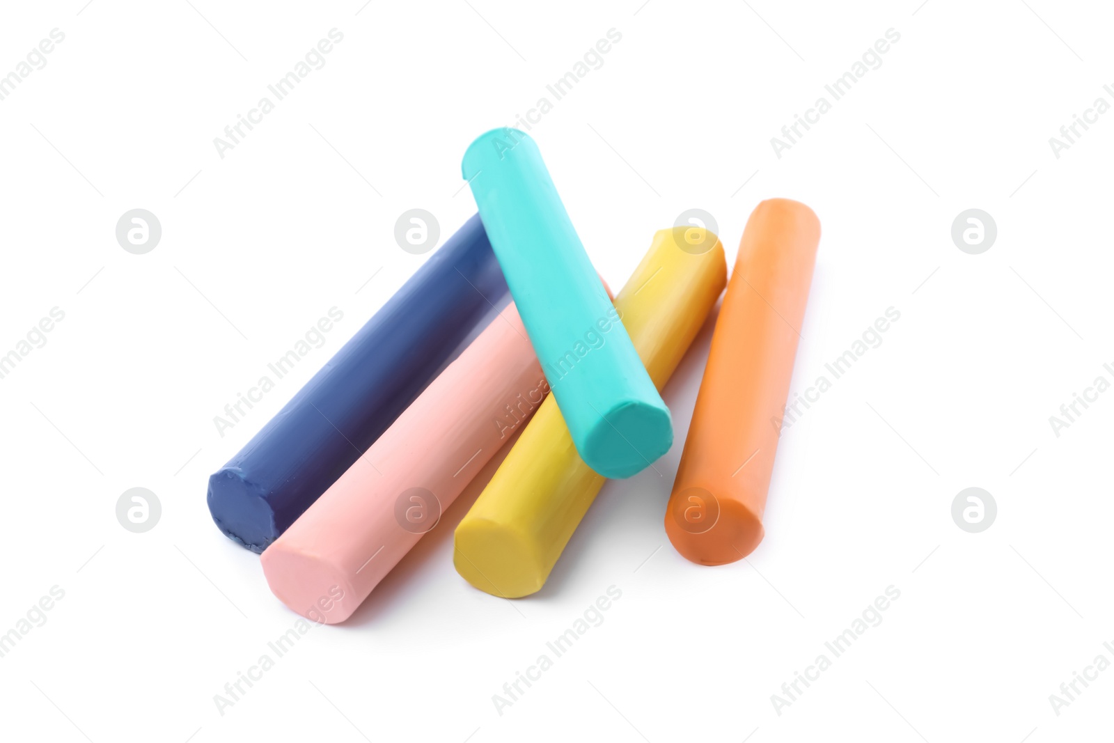 Photo of Many different colorful plasticine pieces on white background