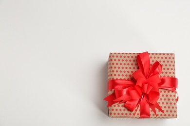 Photo of Beautifully decorated gift box on white background, top view