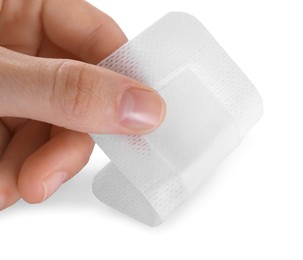 Photo of Woman with medical adhesive bandage isolated on white, closeup