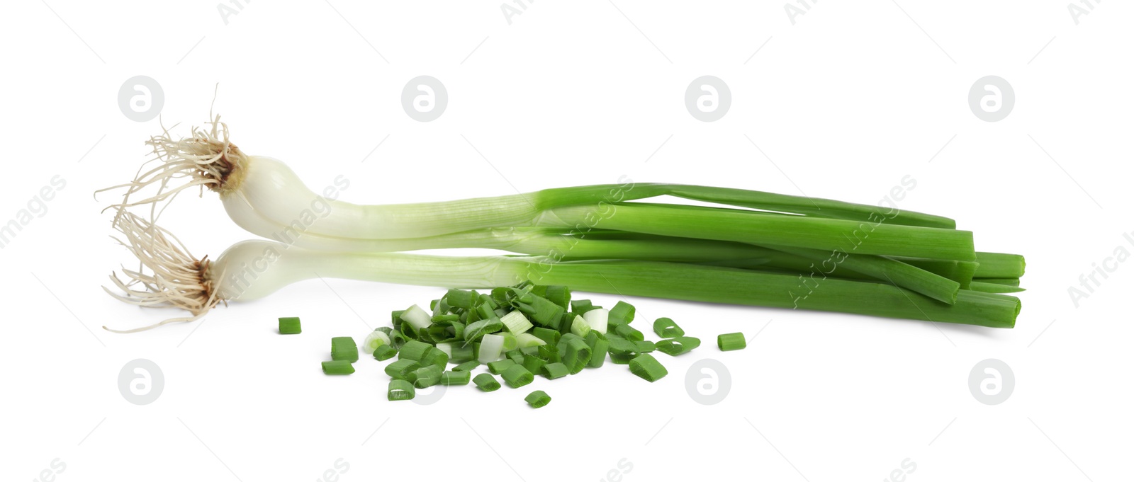 Photo of Whole and chopped green onion isolated on white