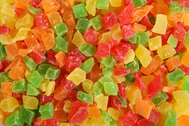 Mix of delicious candied fruits as background, closeup