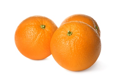 Photo of Delicious fresh ripe oranges on white background