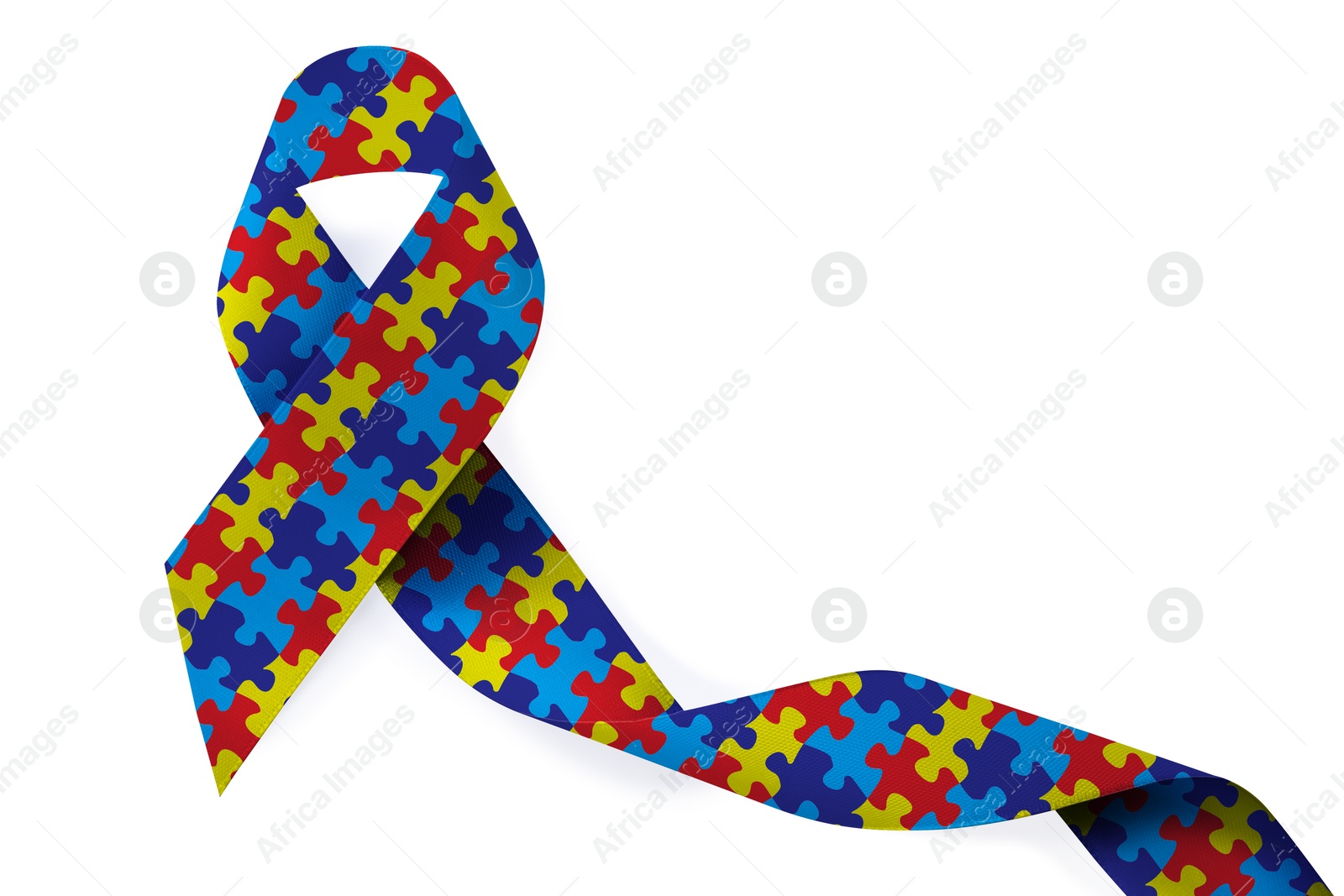 Image of World Autism Awareness Day. Colorful puzzle ribbon on white background, top view