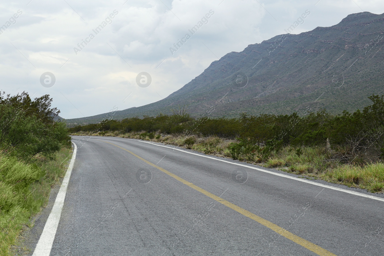 Photo of Beautiful view of empty asphalt highway outdoors. Road trip