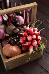 Photo of Different fresh ripe vegetables on wooden table