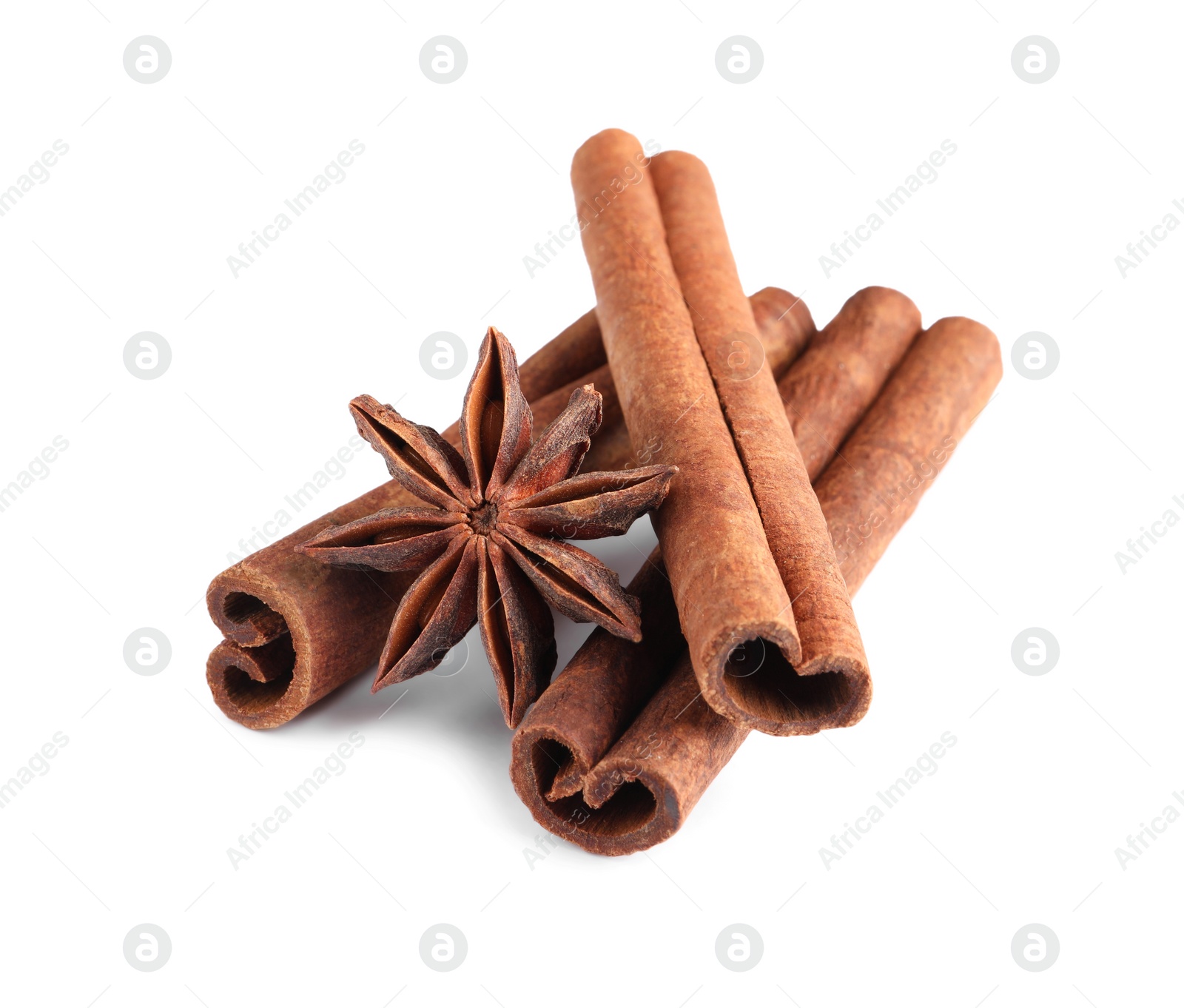 Photo of Cinnamon sticks and anise star isolated on white