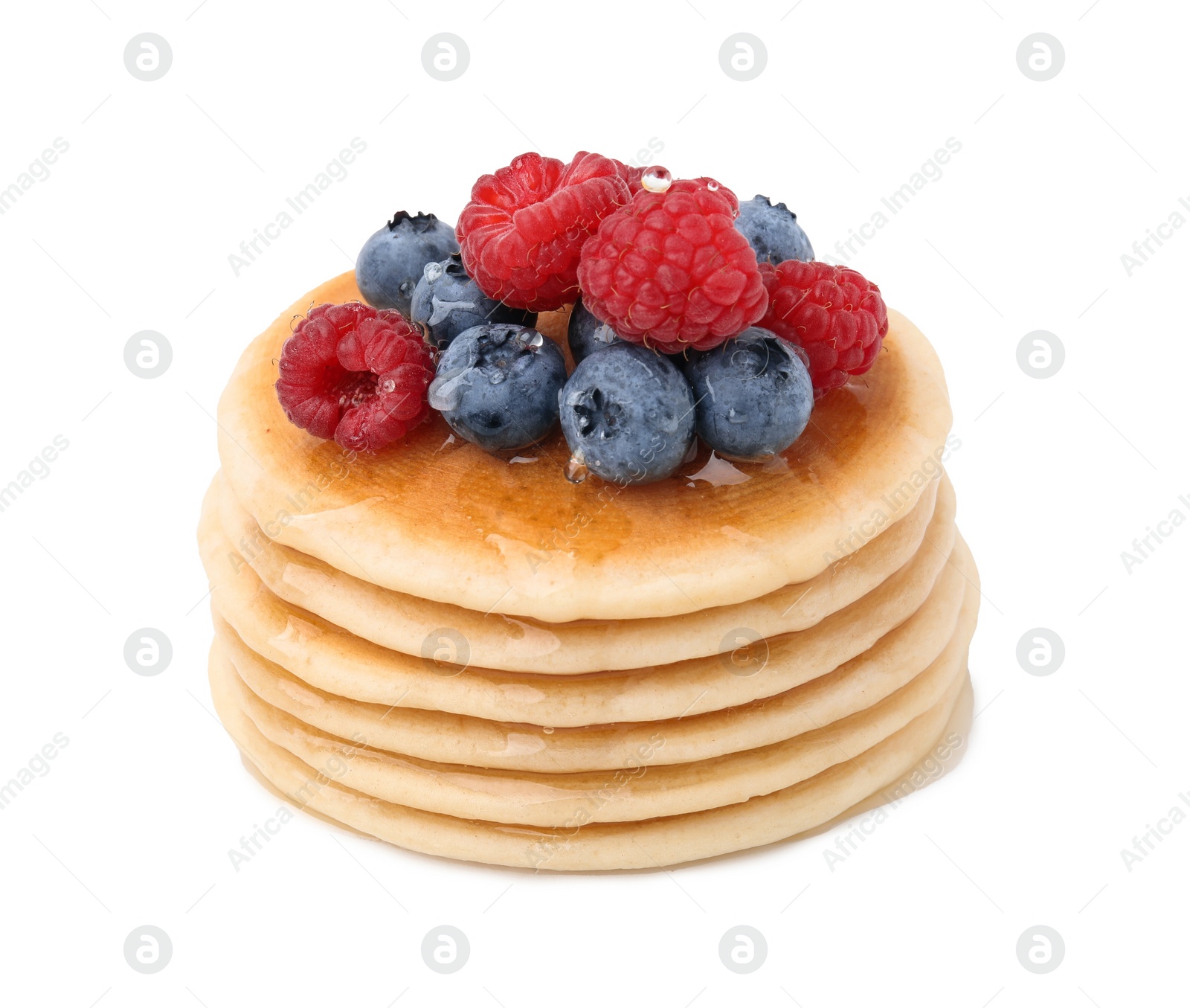 Photo of Delicious pancakes with berries and honey isolated on white