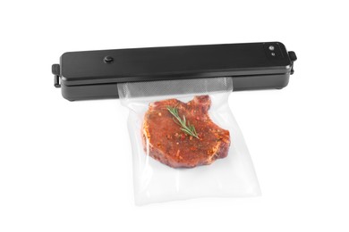 Photo of Sealer for vacuum packing and plastic bag with tasty meat steak, rosemary isolated on white