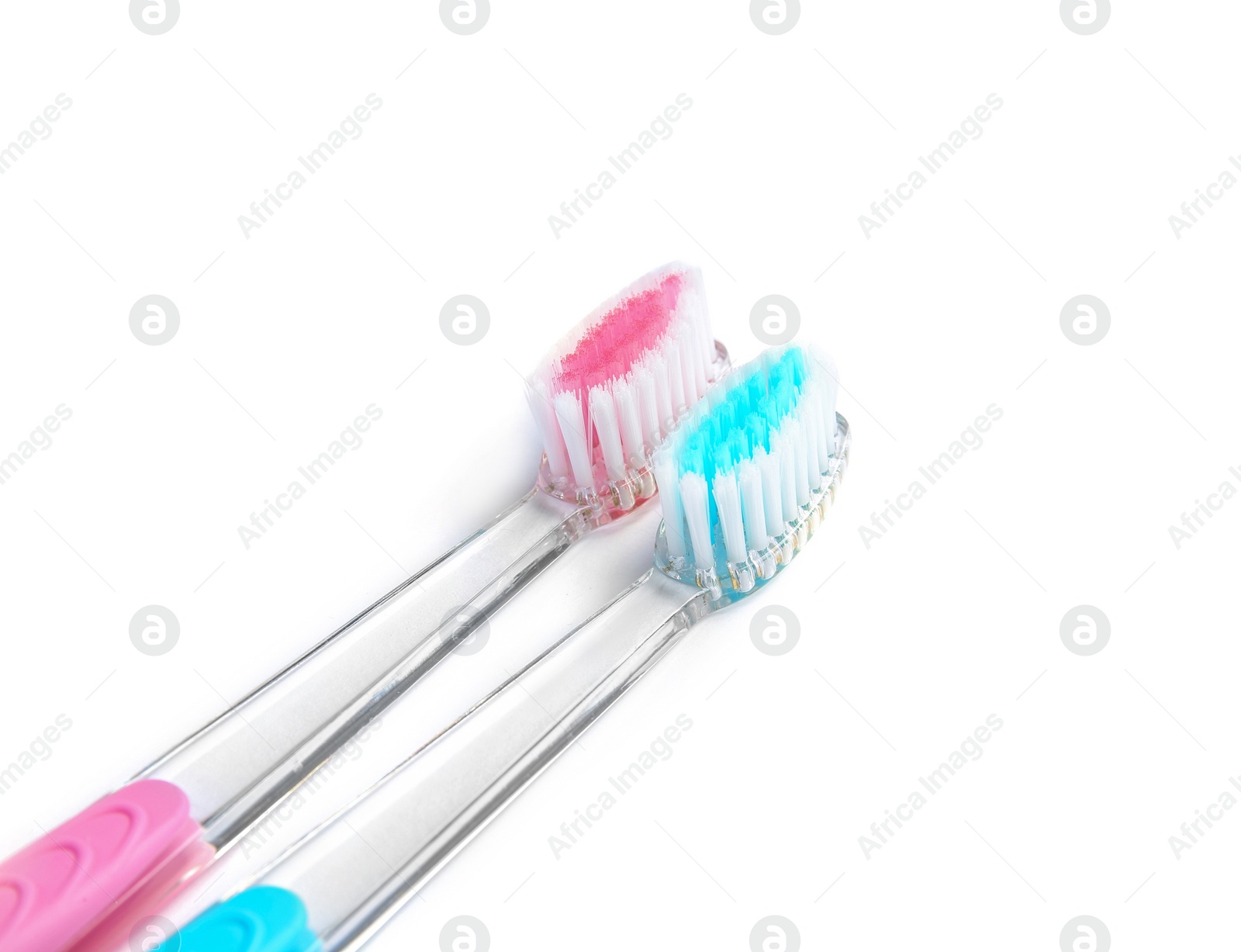 Photo of Color toothbrushes on white background. Dental care