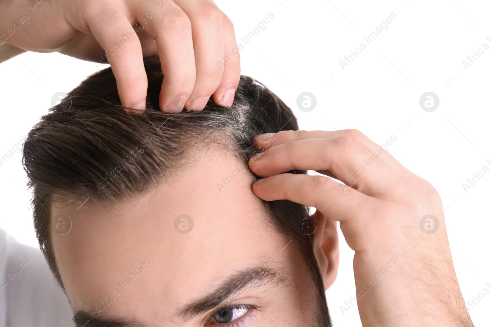 Image of Young man with grey hair on white background, closeup