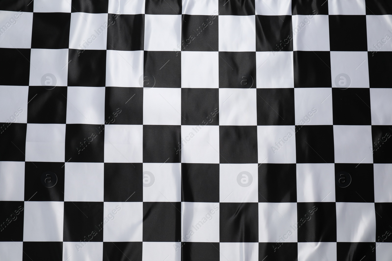 Photo of Checkered satin fabric as background, closeup view