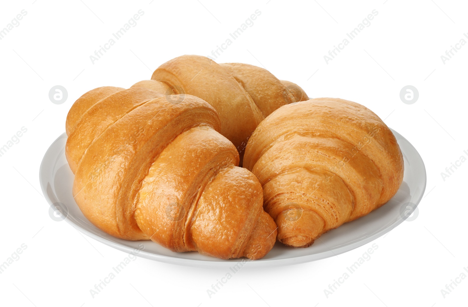 Photo of Plate with delicious fresh croissants isolated on white