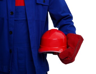 Photo of Young man holding red hardhat on white background, closeup. Safety equipment