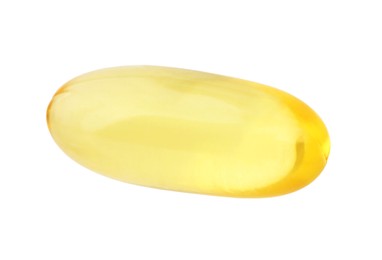 Photo of One yellow vitamin capsule isolated on white, top view