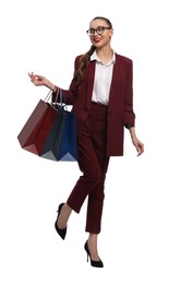 Photo of Stylish young businesswoman with shopping bags on white background