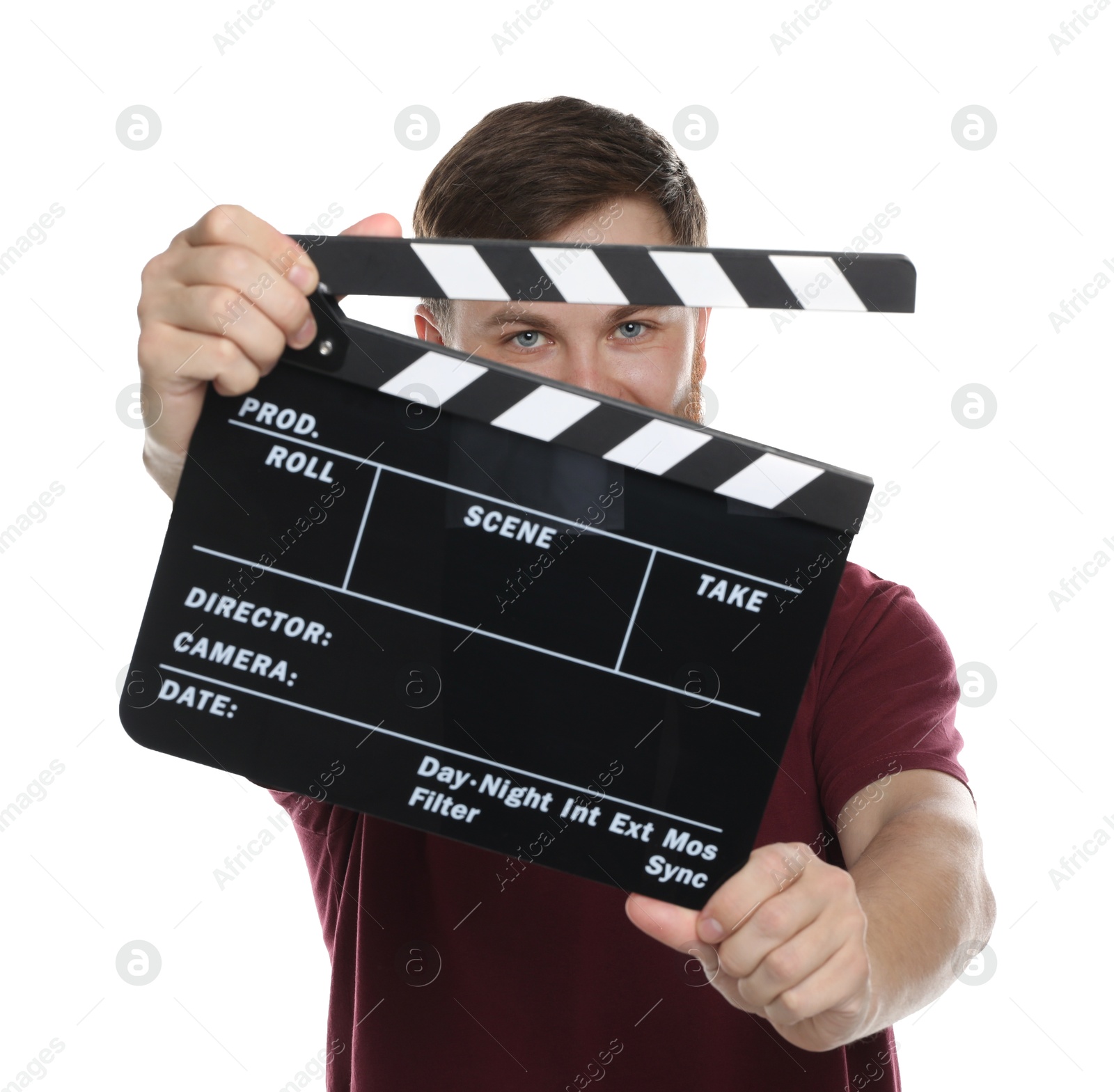 Photo of Making movie. Man with clapperboard on white background