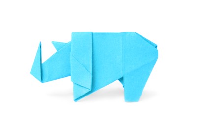 Photo of Origami art. Handmade light blue paper rhinoceros on white background