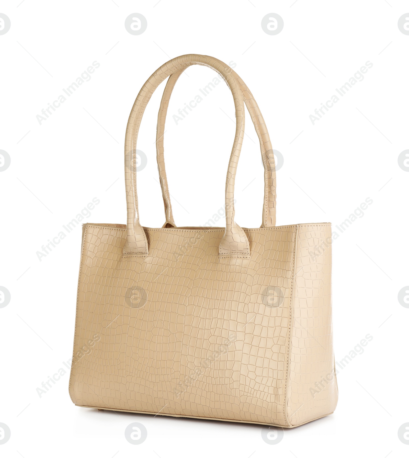 Photo of Beige women's leather bag isolated on white