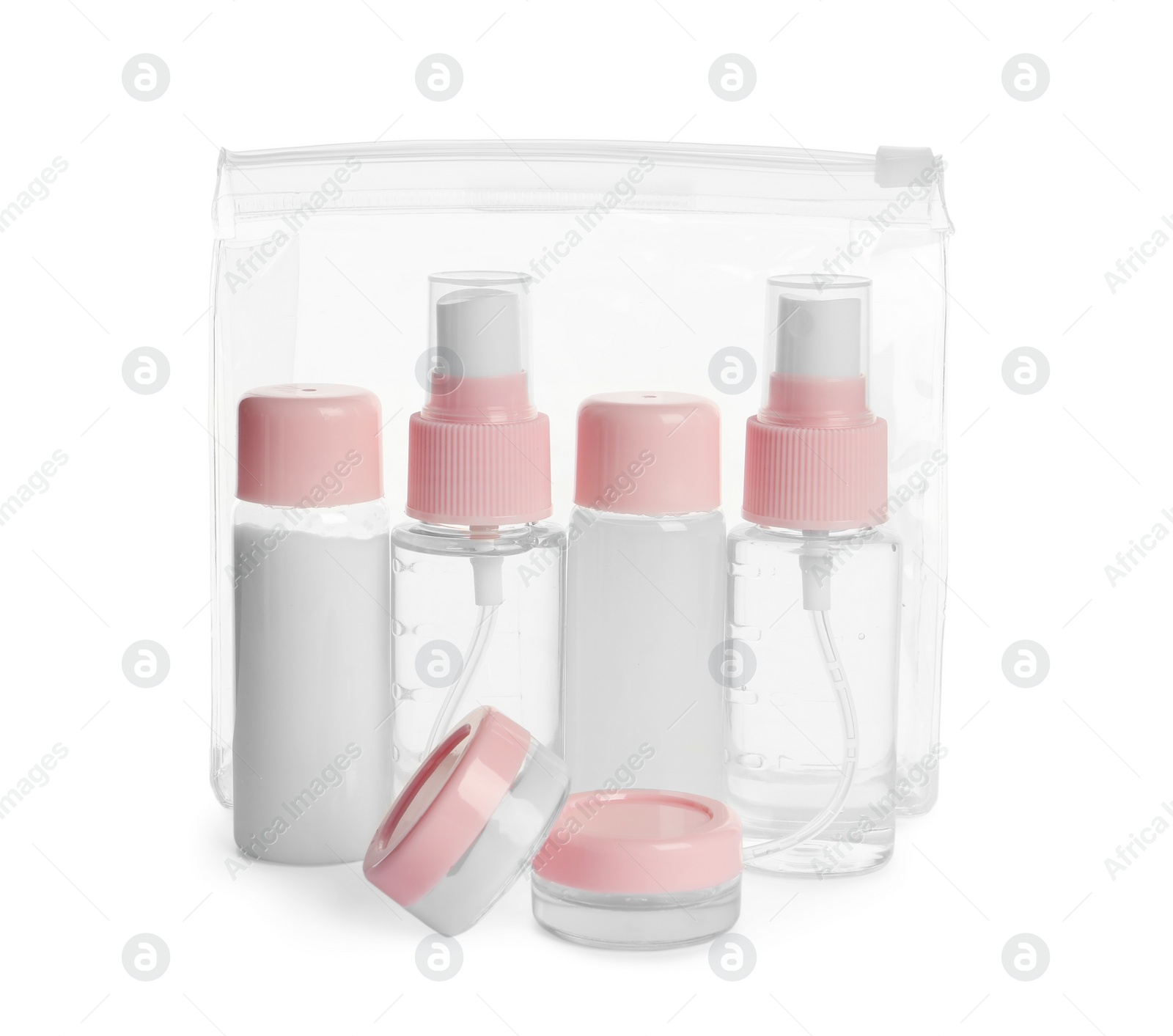 Photo of Cosmetic travel kit with plastic bag isolated on white