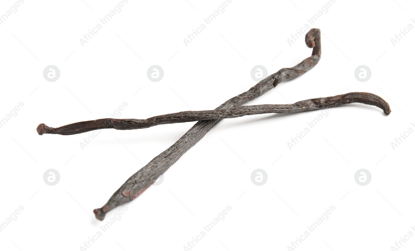 Photo of Dried aromatic vanilla sticks on white background