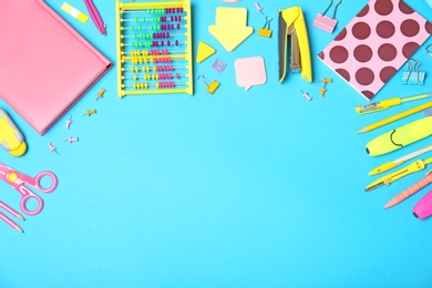 Photo of Flat lay composition with different school stationery on color background