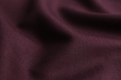 Texture of beautiful dark red fabric as background, closeup
