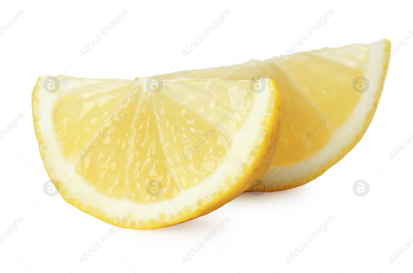 Photo of Pieces of fresh lemon isolated on white