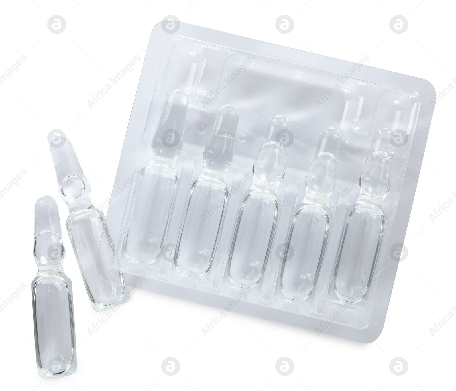 Photo of Glass ampoules with pharmaceutical product on white background, top view