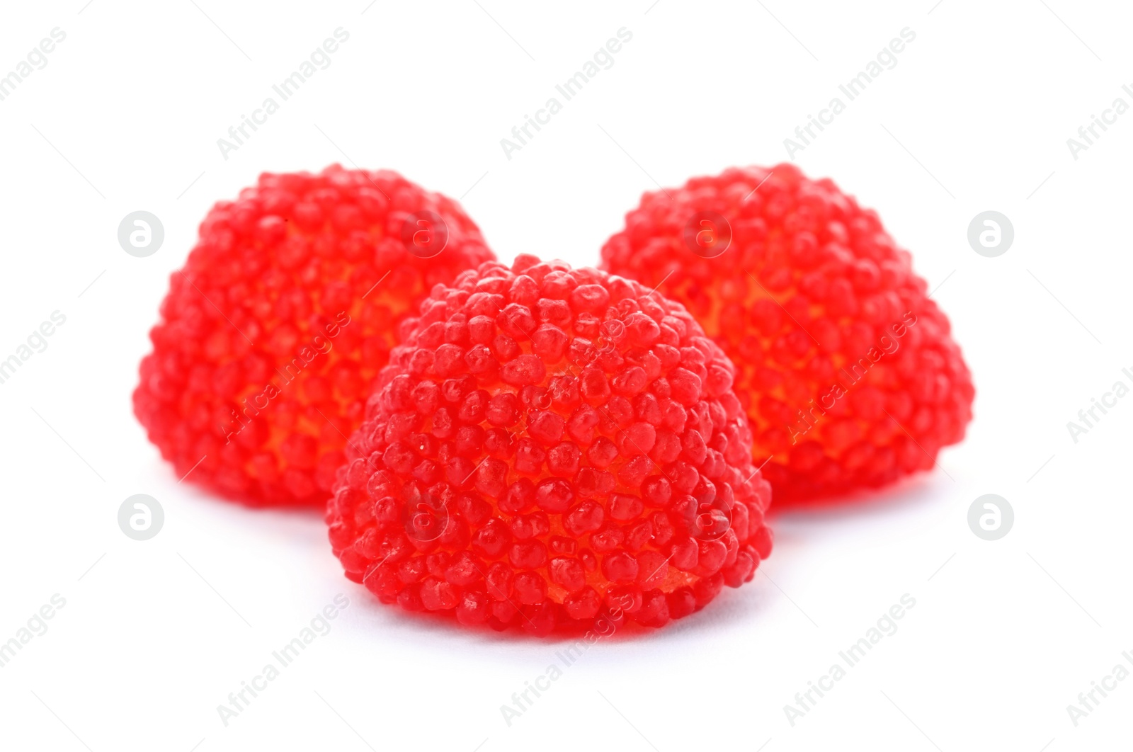 Photo of Delicious colorful chewing candies on white background