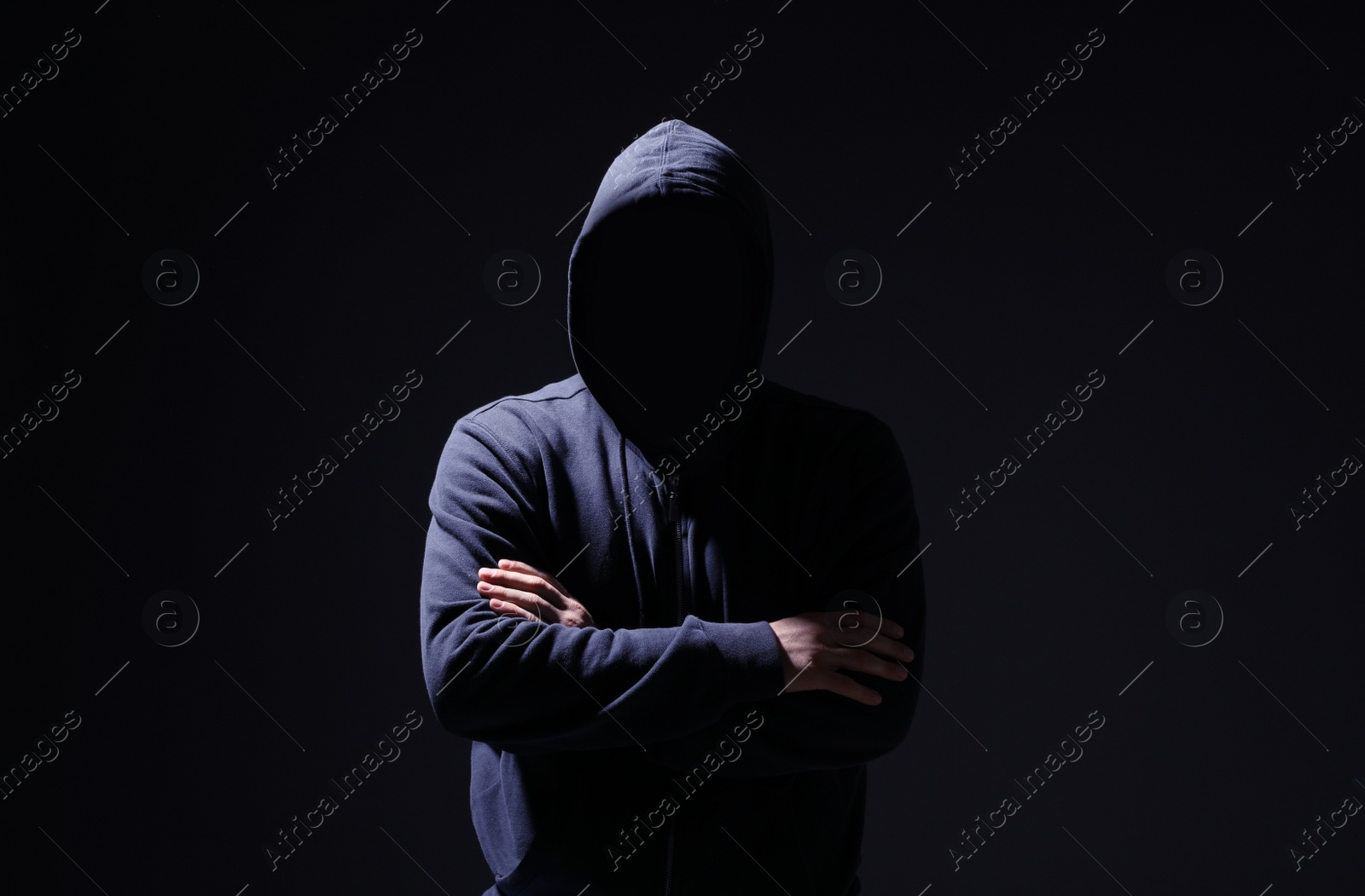 Photo of Silhouette of anonymous man on black background