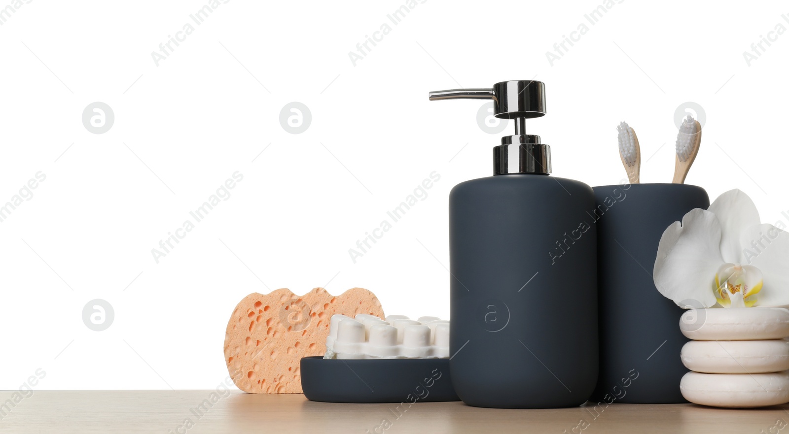 Photo of Bath accessories. Different personal care products and flower on wooden table against white background. Space for text